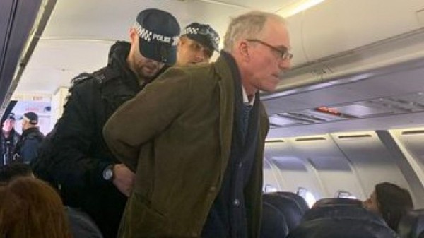 
                              Extinction Rebellion protester climbs on plane at London City Airport
                      