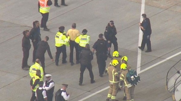 
                              Extinction Rebellion protester climbs on plane at London City Airport
                      