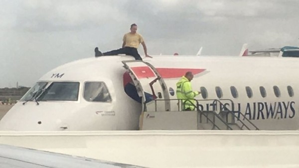 
                              Extinction Rebellion protester climbs on plane at London City Airport
                      